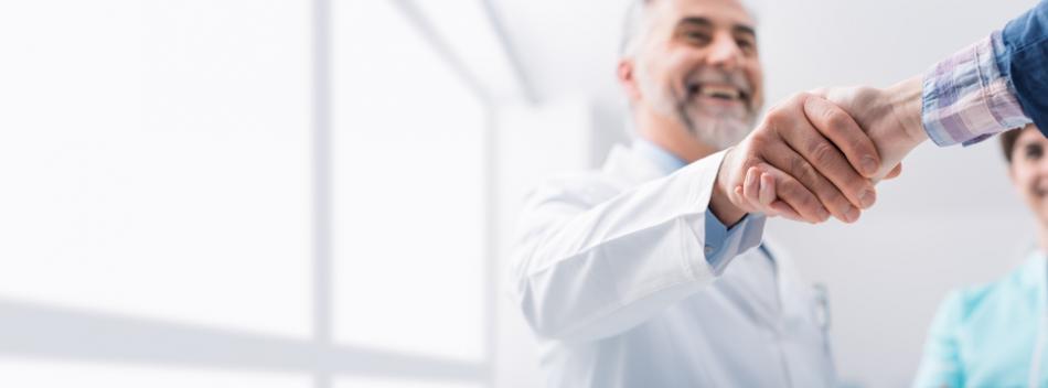 doctor shaking hand of patient